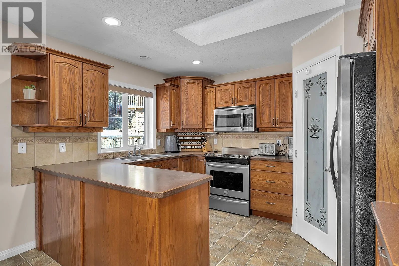 7992 Falcon Ridge Crescent