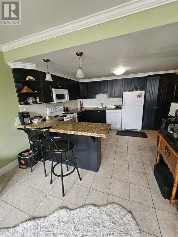 2144 PELISSIER Unit# 103