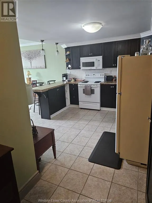 2144 PELISSIER Unit# 103