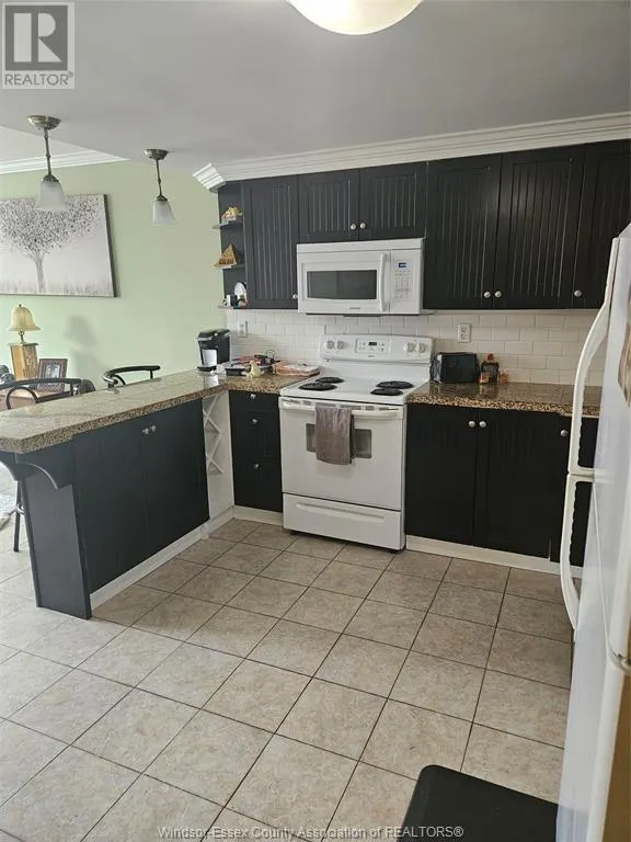 2144 PELISSIER Unit# 103