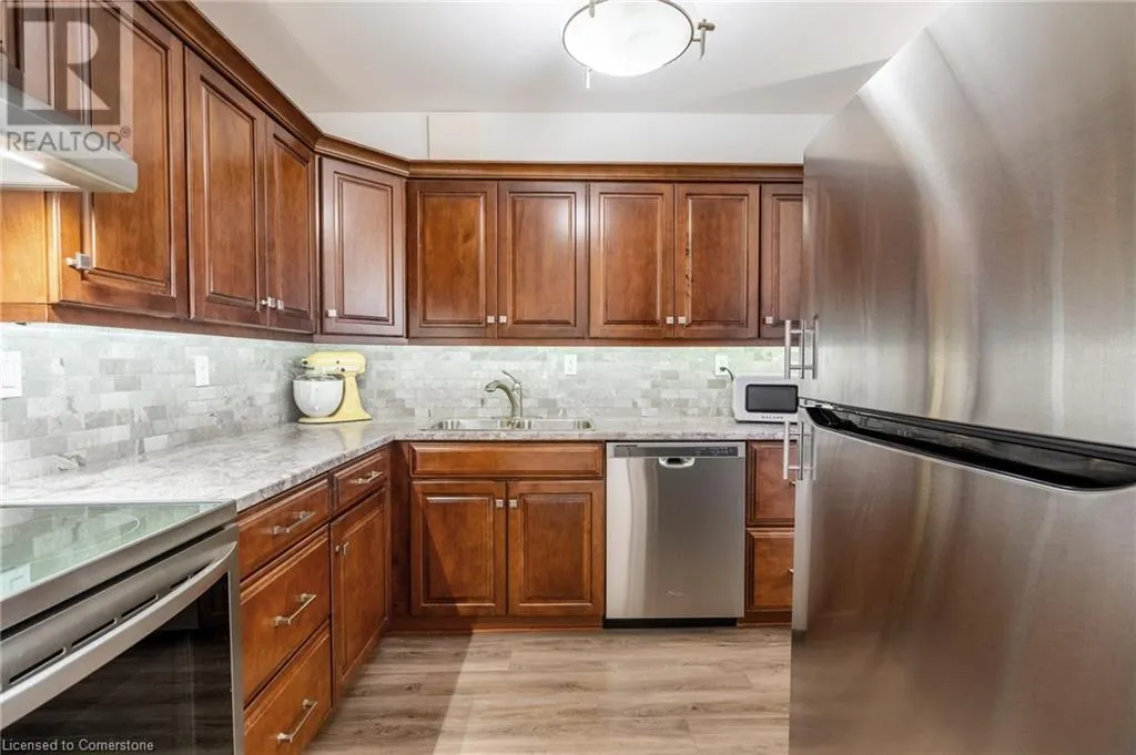 1450 GLEN ABBEY Gate Unit# 311, #311