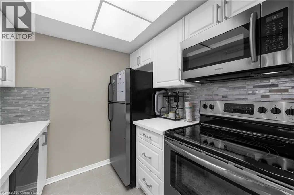 8351 MCLAUGHLIN Road S Unit# 403, #403