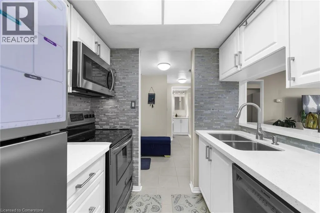 8351 MCLAUGHLIN Road S Unit# 403, #403
