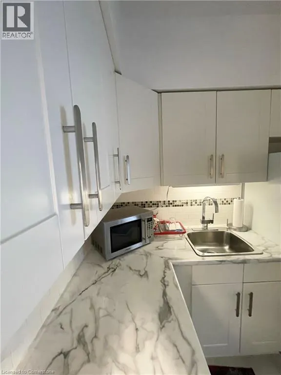 10 WOODMAN Drive S Unit# 101, #101