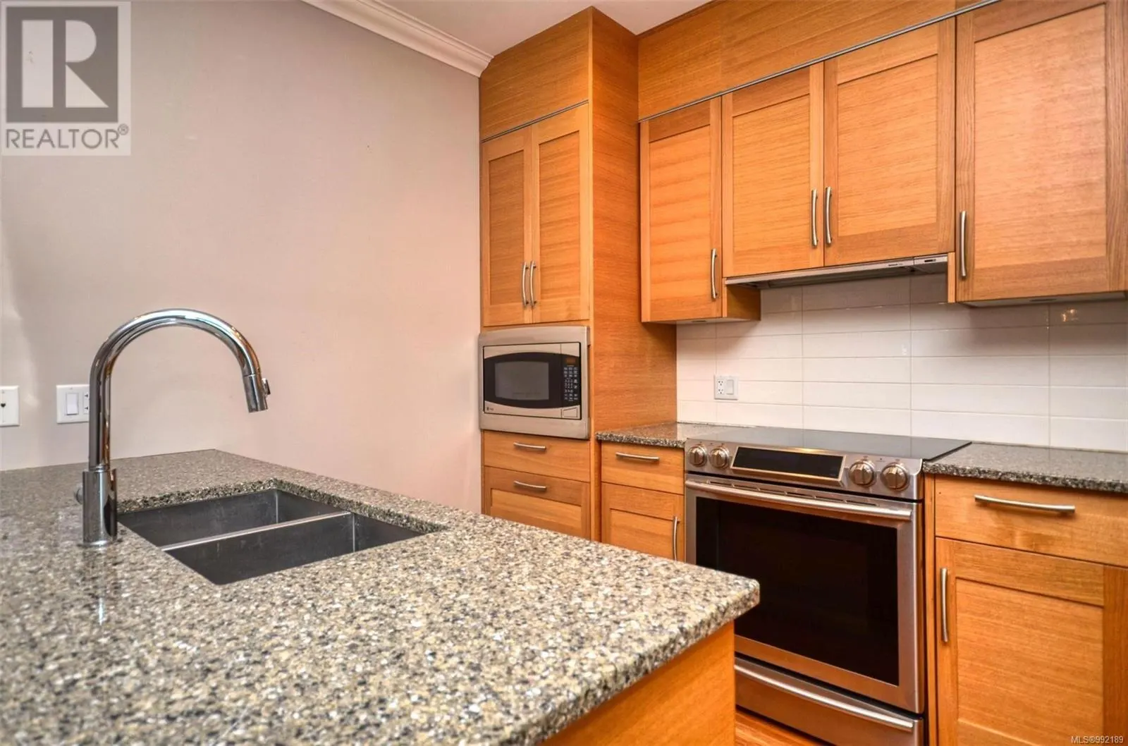 102 9820 Seaport Pl