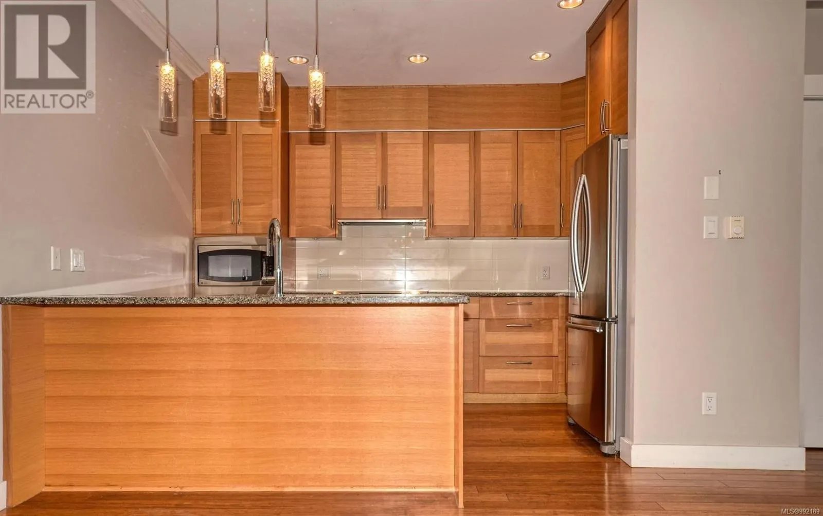 102 9820 Seaport Pl