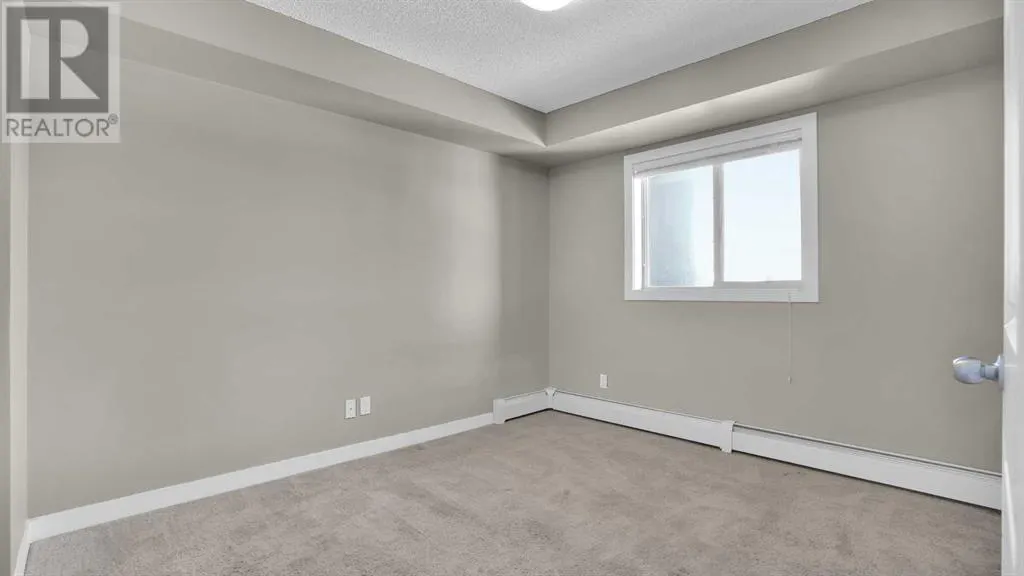 8409, 403 Mackenzie Way SW