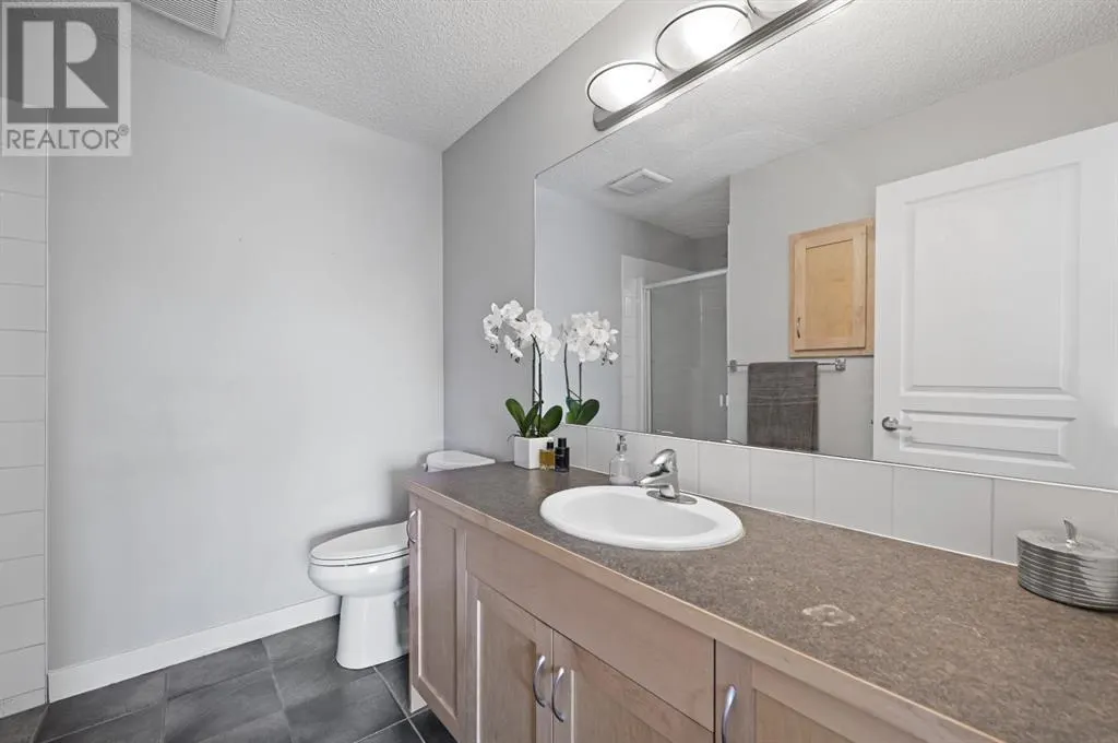 2205, 211 Aspen Stone Boulevard SW
