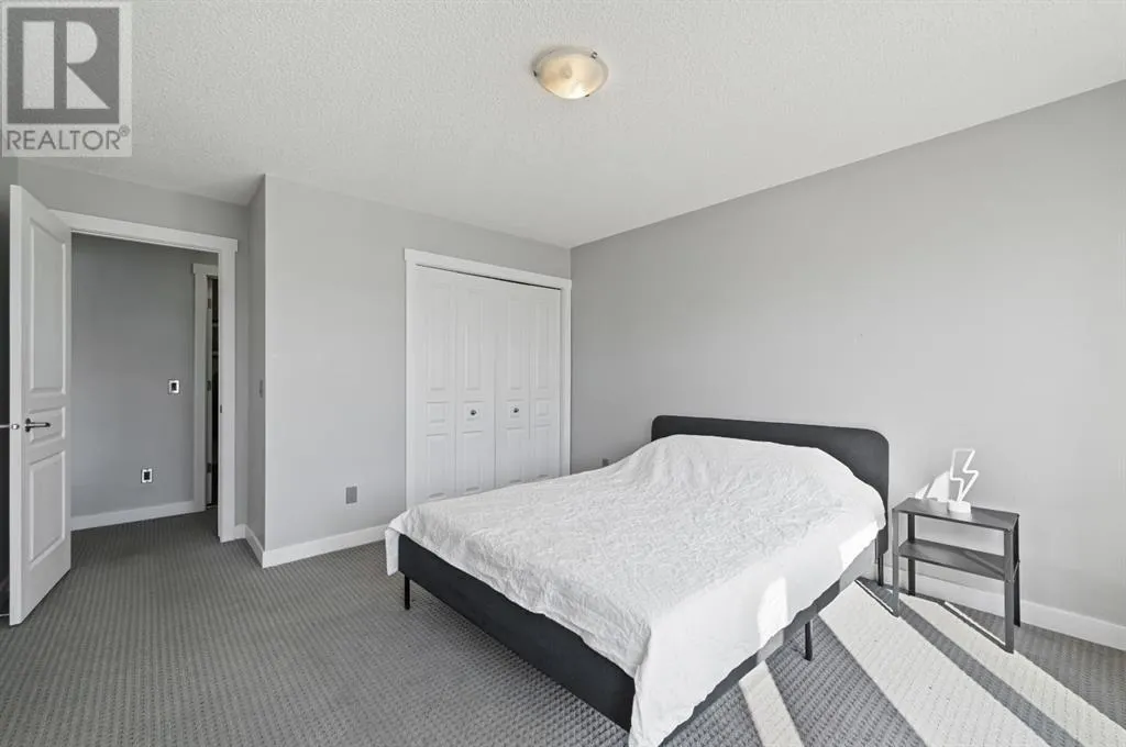 2205, 211 Aspen Stone Boulevard SW