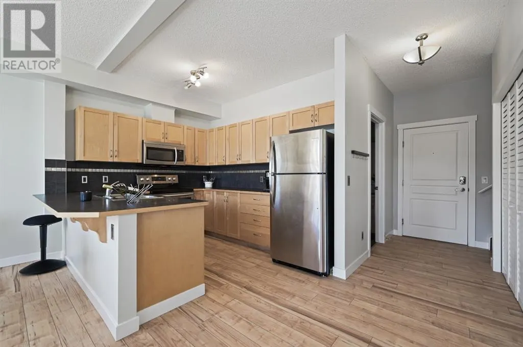 2205, 211 Aspen Stone Boulevard SW