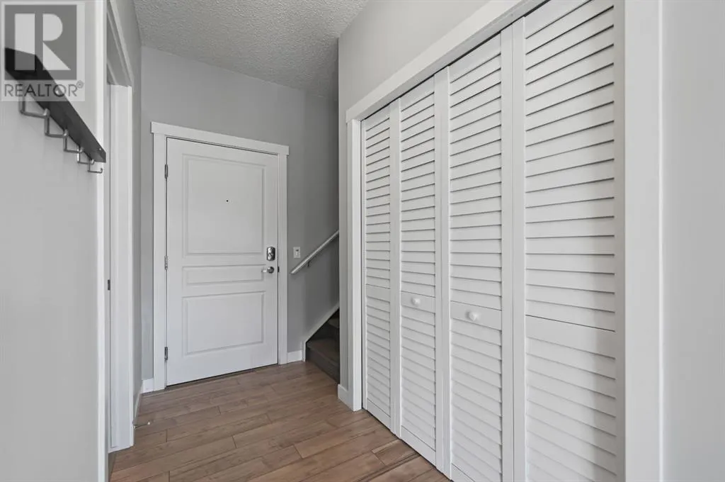 2205, 211 Aspen Stone Boulevard SW
