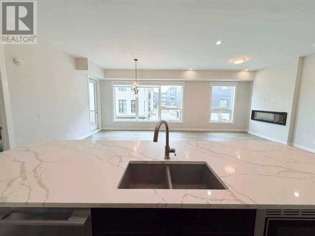 202, 235 Lebel Crescent NW