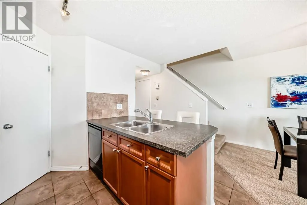 12, 21 McKenzie Towne Gate SE