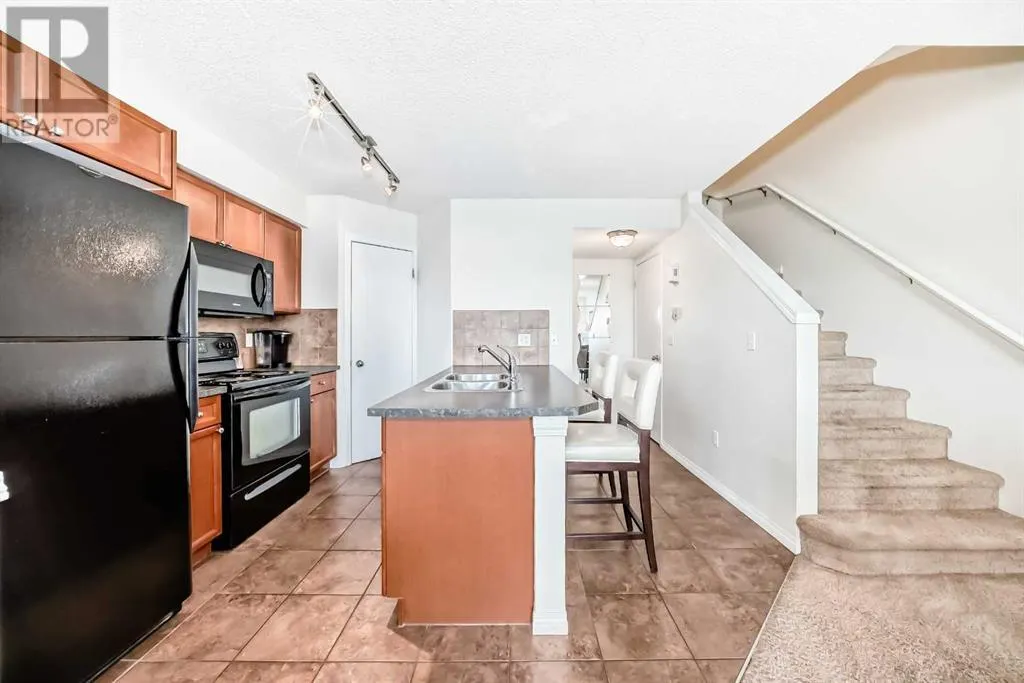 12, 21 McKenzie Towne Gate SE