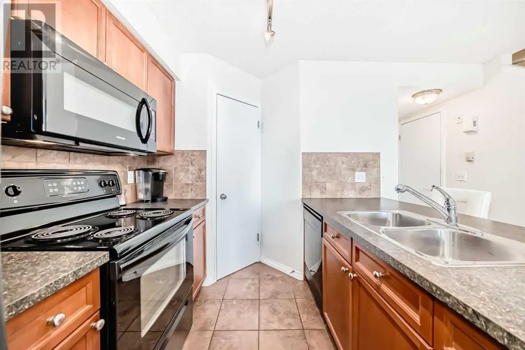 12, 21 McKenzie Towne Gate SE