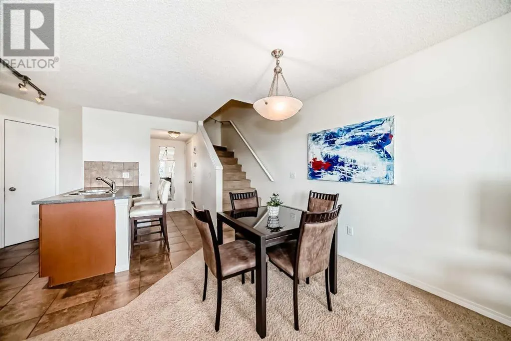 12, 21 McKenzie Towne Gate SE
