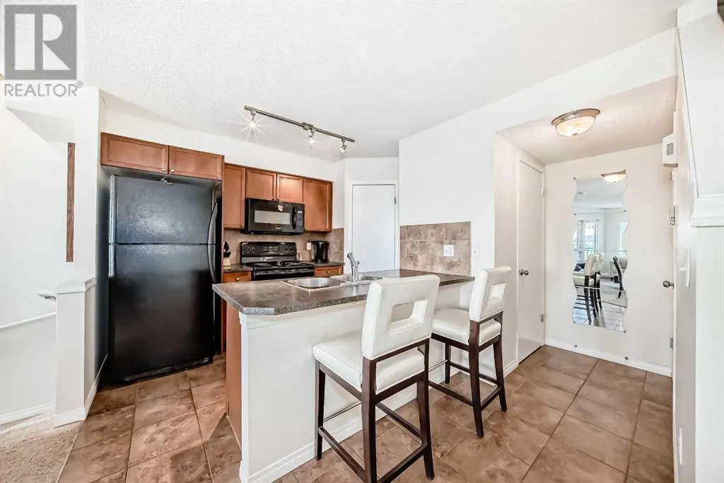 12, 21 McKenzie Towne Gate SE