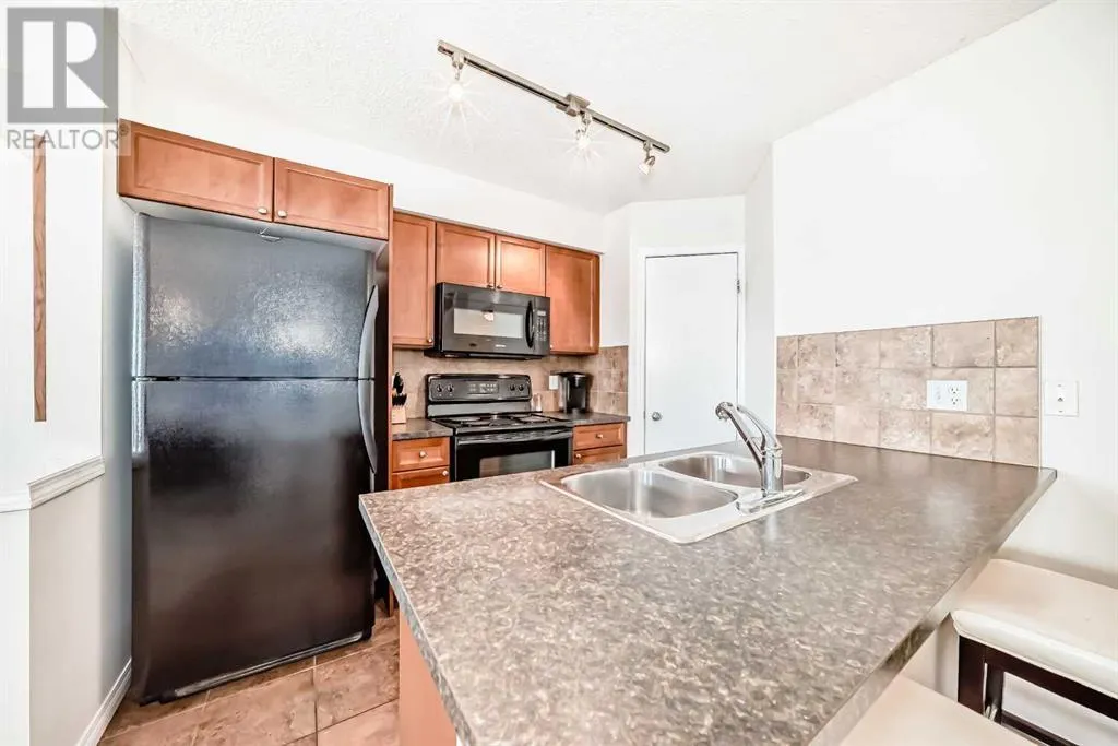12, 21 McKenzie Towne Gate SE
