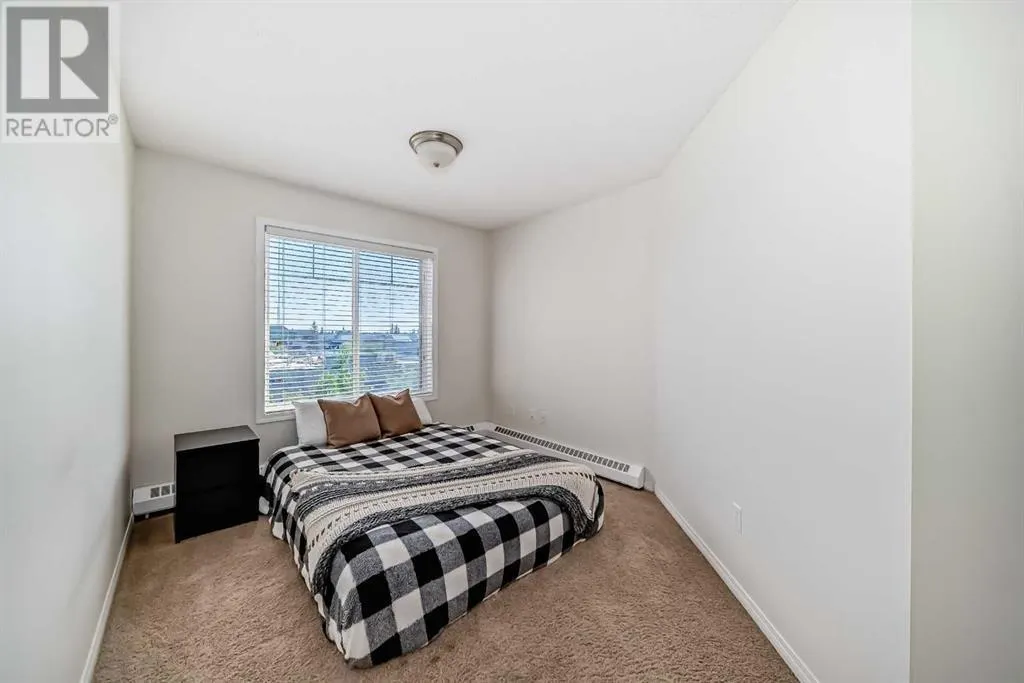 12, 21 McKenzie Towne Gate SE