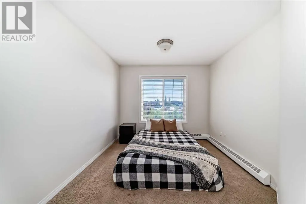 12, 21 McKenzie Towne Gate SE