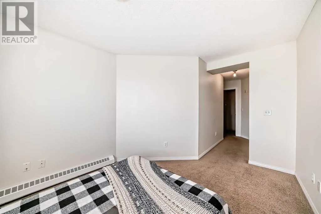 12, 21 McKenzie Towne Gate SE