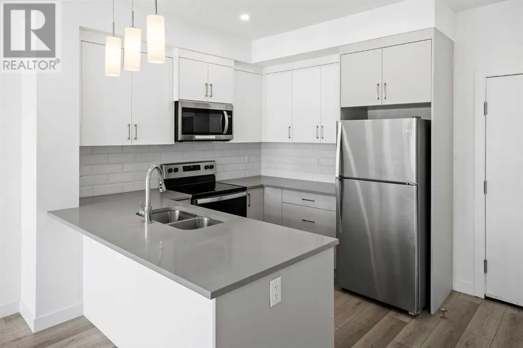 403, 205 Spring Creek Common SW