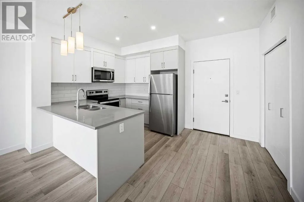 403, 205 Spring Creek Common SW