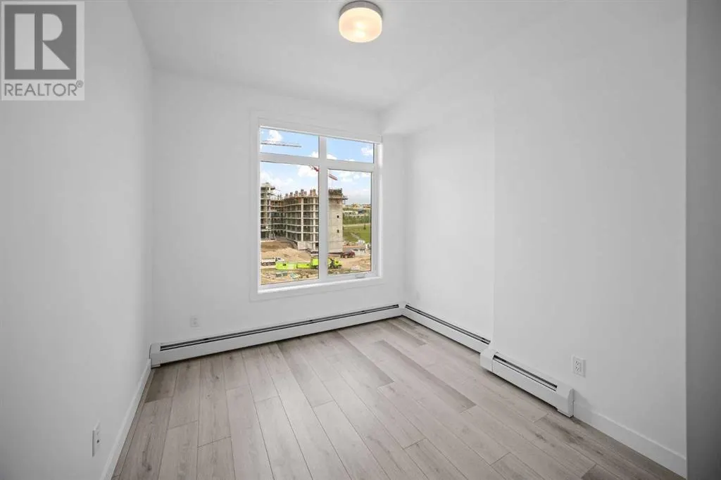 403, 205 Spring Creek Common SW