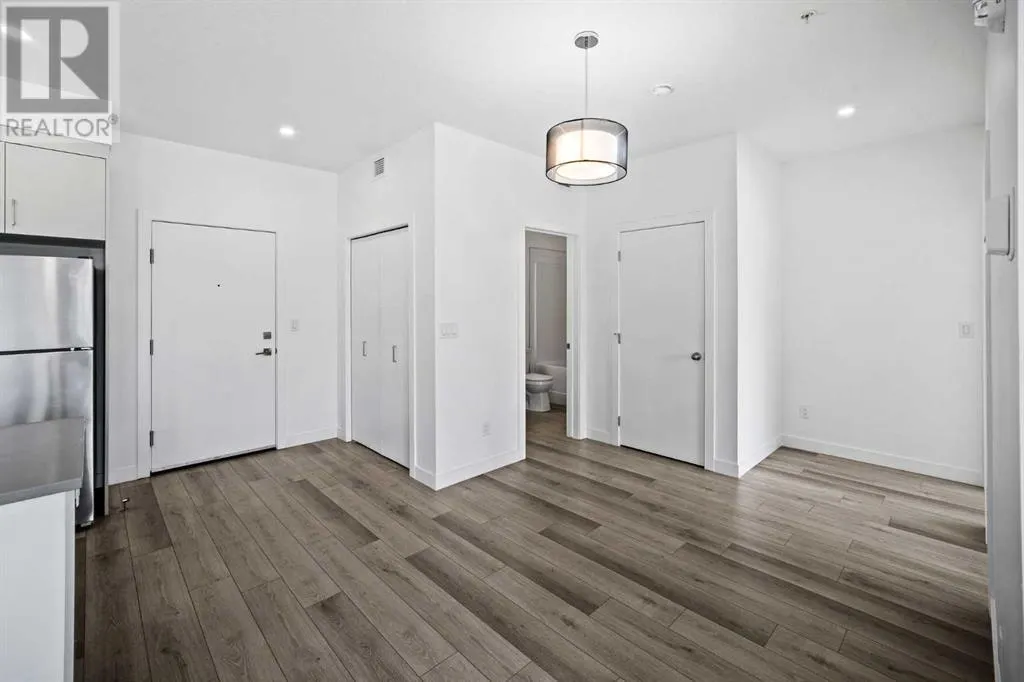 403, 205 Spring Creek Common SW