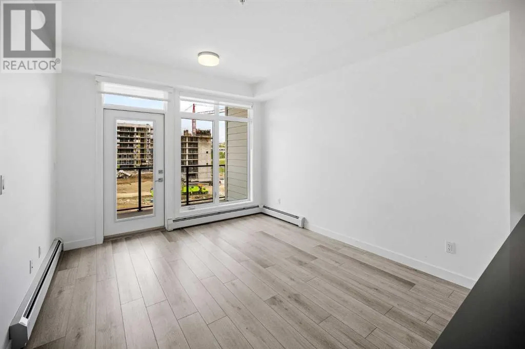 403, 205 Spring Creek Common SW