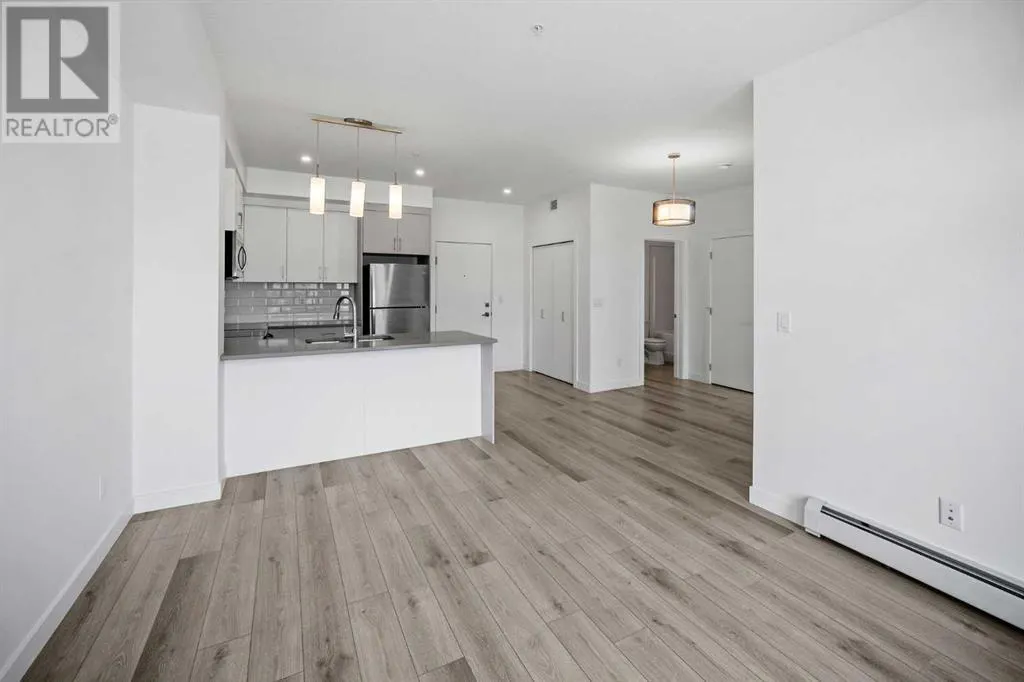 403, 205 Spring Creek Common SW