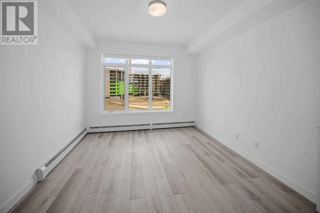 403, 205 Spring Creek Common SW