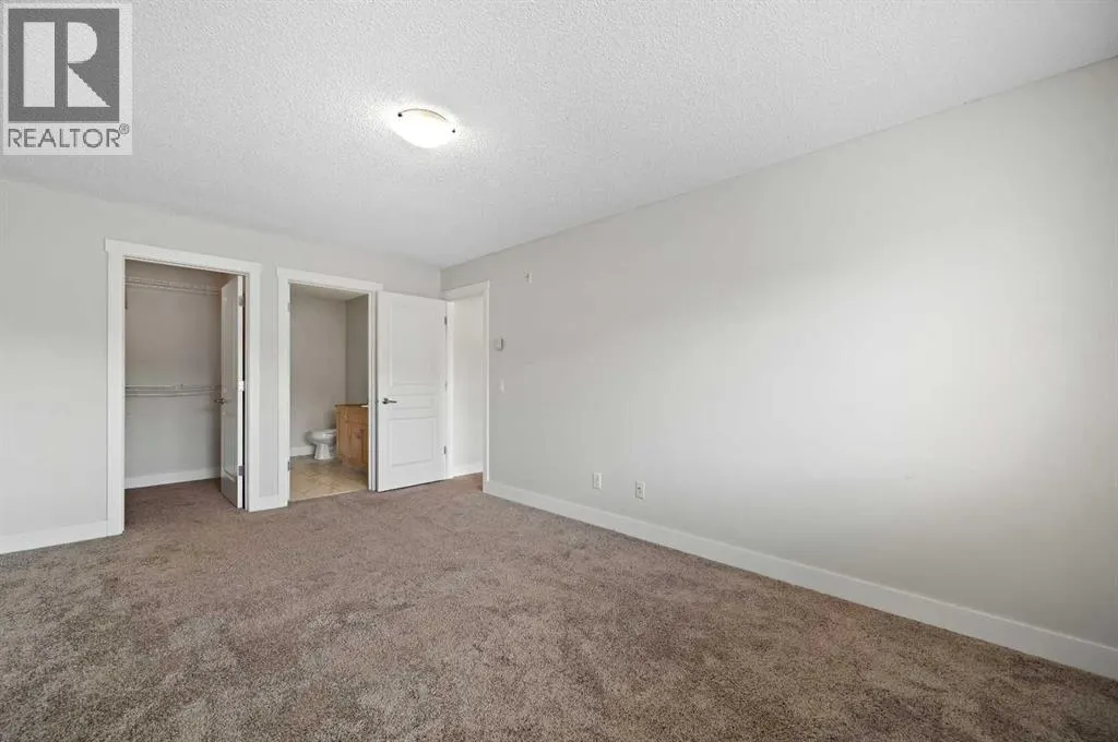 1212, 211 Aspen Stone Boulevard SW