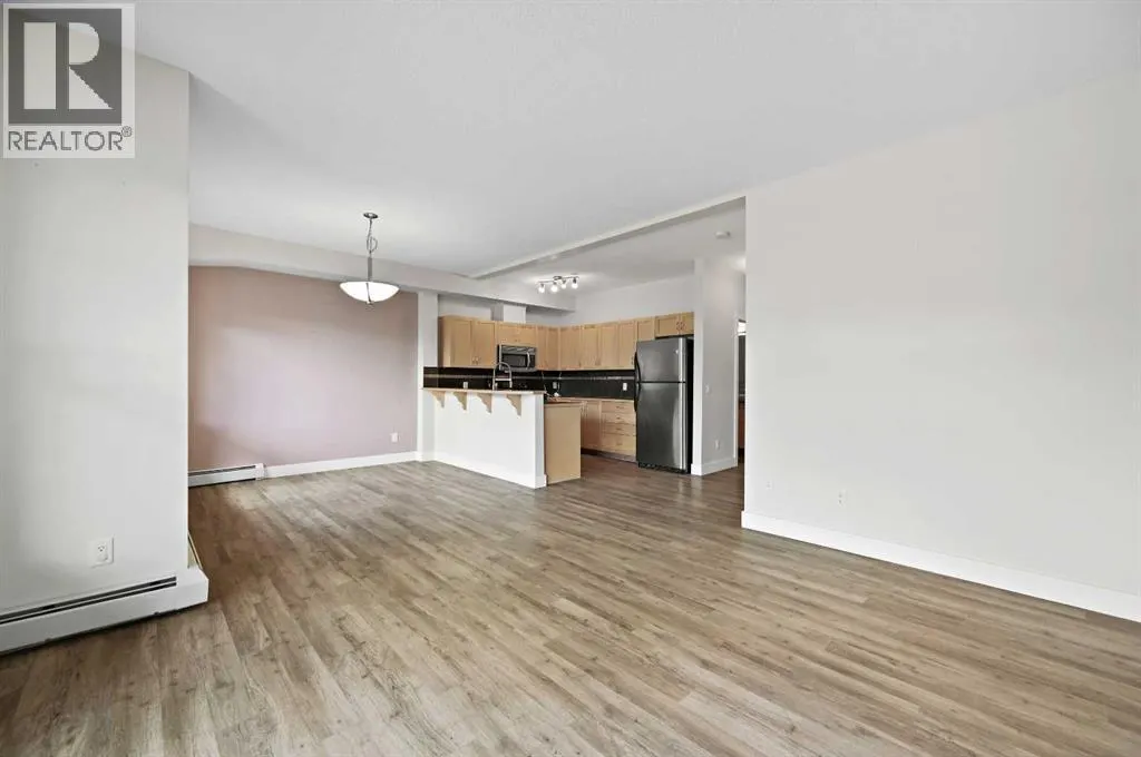 1212, 211 Aspen Stone Boulevard SW