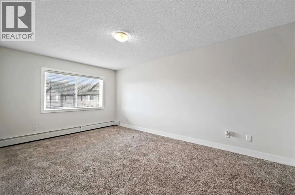 1212, 211 Aspen Stone Boulevard SW