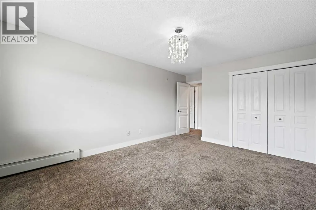 1212, 211 Aspen Stone Boulevard SW