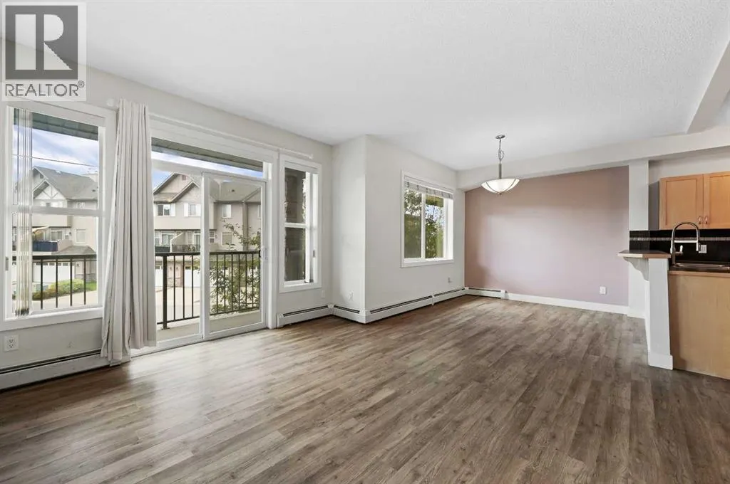 1212, 211 Aspen Stone Boulevard SW