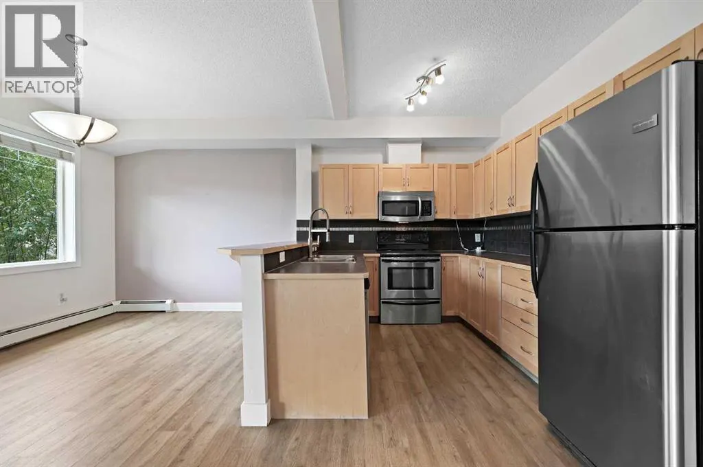 1212, 211 Aspen Stone Boulevard SW