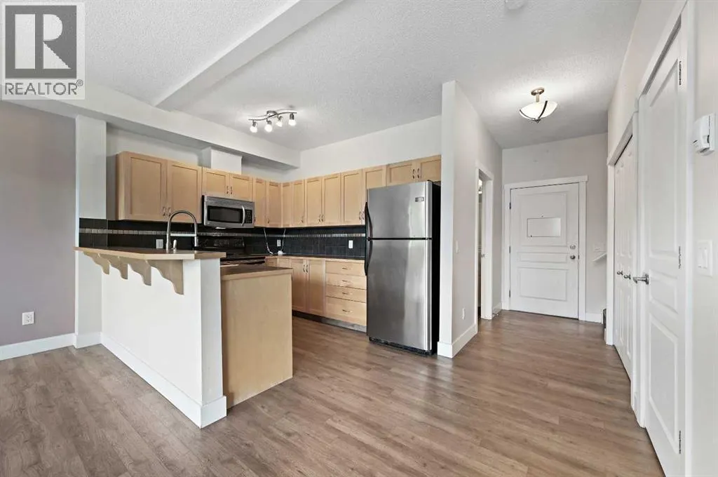 1212, 211 Aspen Stone Boulevard SW