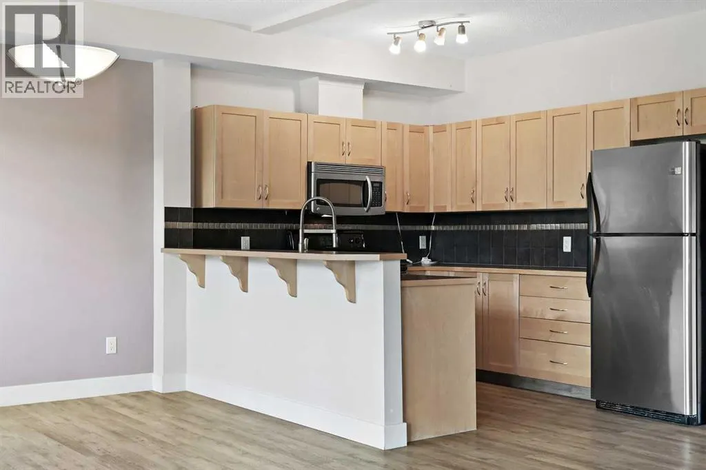 1212, 211 Aspen Stone Boulevard SW