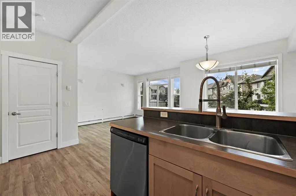 1212, 211 Aspen Stone Boulevard SW