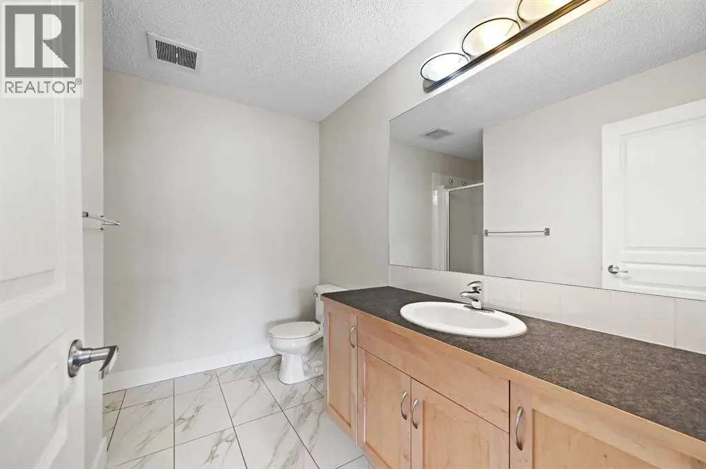 1212, 211 Aspen Stone Boulevard SW