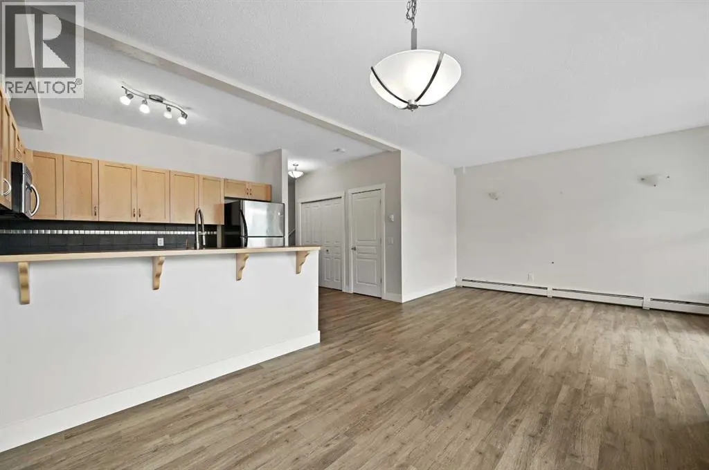 1212, 211 Aspen Stone Boulevard SW