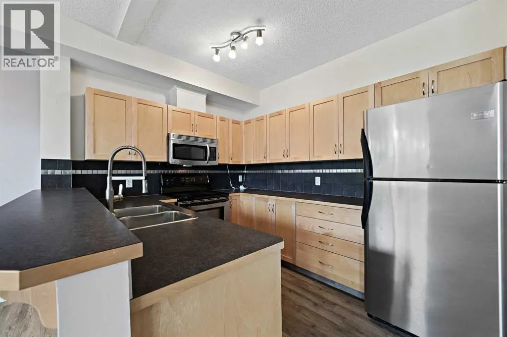 1212, 211 Aspen Stone Boulevard SW
