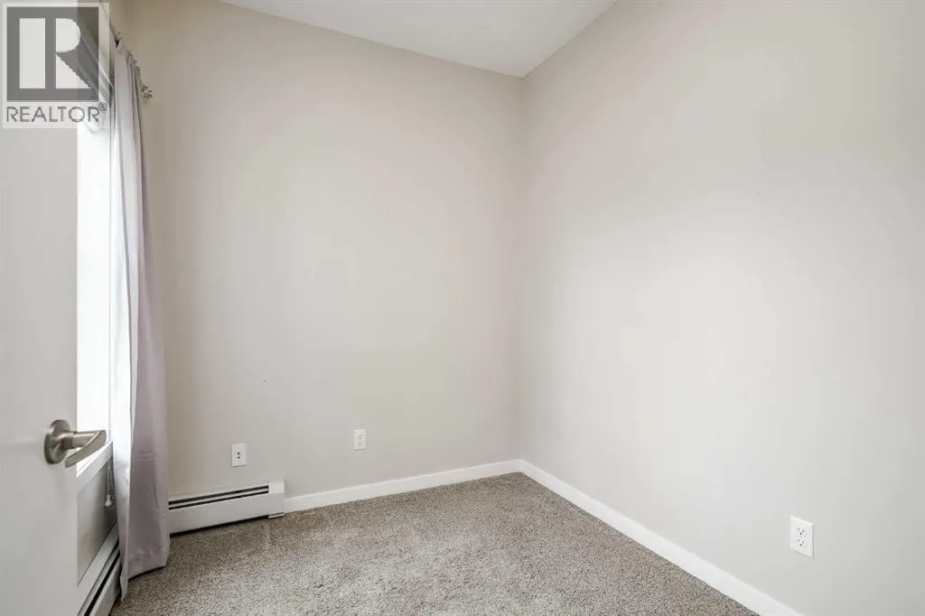 205, 402 Marquis Lane SE