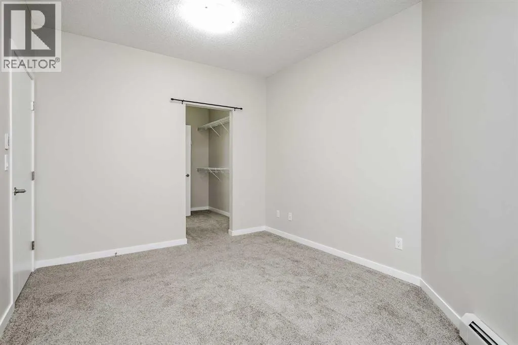 205, 402 Marquis Lane SE