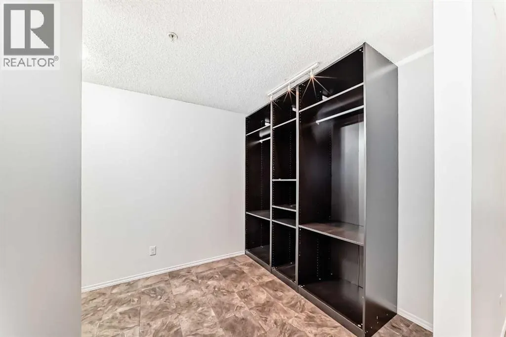 9113, 403 Mackenzie Way SW