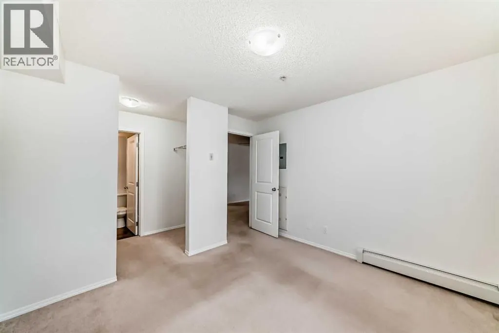 9113, 403 Mackenzie Way SW