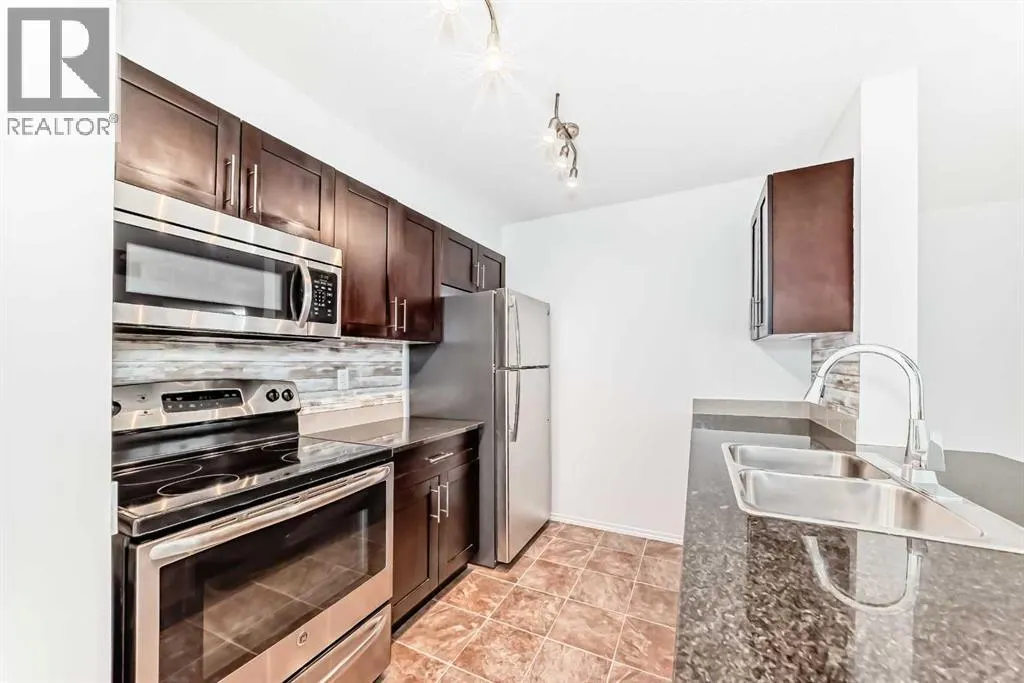 9113, 403 Mackenzie Way SW
