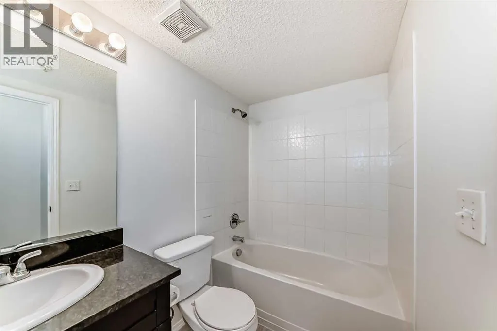 9113, 403 Mackenzie Way SW